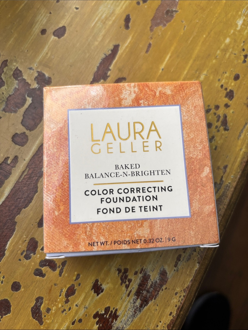 Laura Geller Color Correcting Foundation in Orange and Gold Packaging